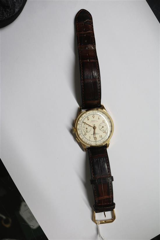 A gentlemans Swiss 18ct gold chronograph manual wind wrist watch.